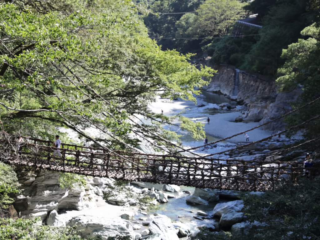 The Oku-Iya Kazurabashi Bridges are a pair of historic suspension bridges made of mountain vines, hidden deep within the scenic valley of Tokushi.