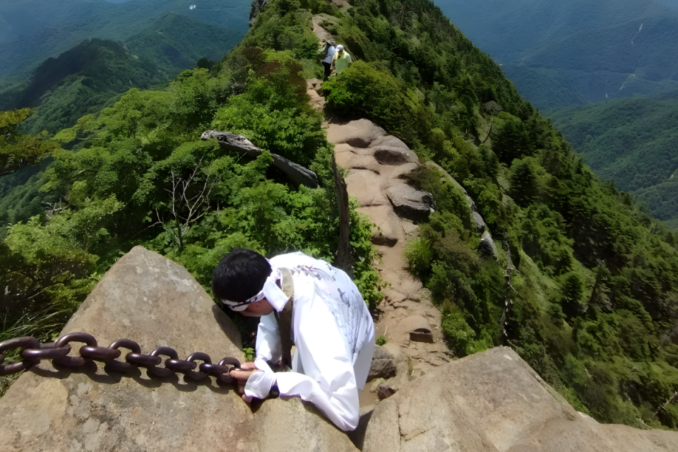 A Yamabushi traverses the ridge to Tengu-dake, one of Mt. Ishizuchi’s many gyoba, or places of ascetic practice.