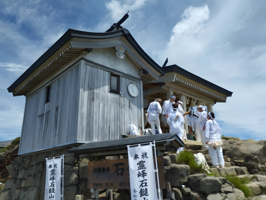 : Yamabushi gather at Mt. Ishzuchi’s summit shrine. The shrine’s annual festival, held in July, draws practitioners from all over Shikoku and Japan. 
