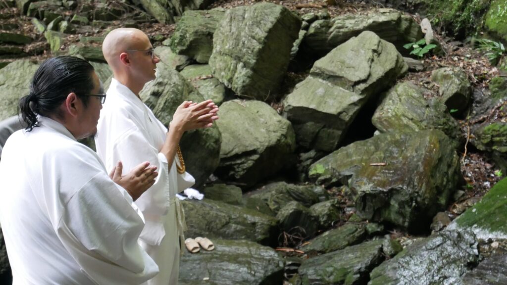 Two American residents of Shikoku prepare for takigyo, waterfall meditation, at Konji-ji, a temple in Tokushima with deep Shugendo ties