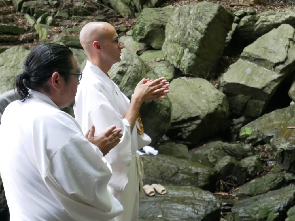 Two American residents of Shikoku prepare for takigyo, waterfall meditation, at Konji-ji, a temple in Tokushima with deep Shugendo ties