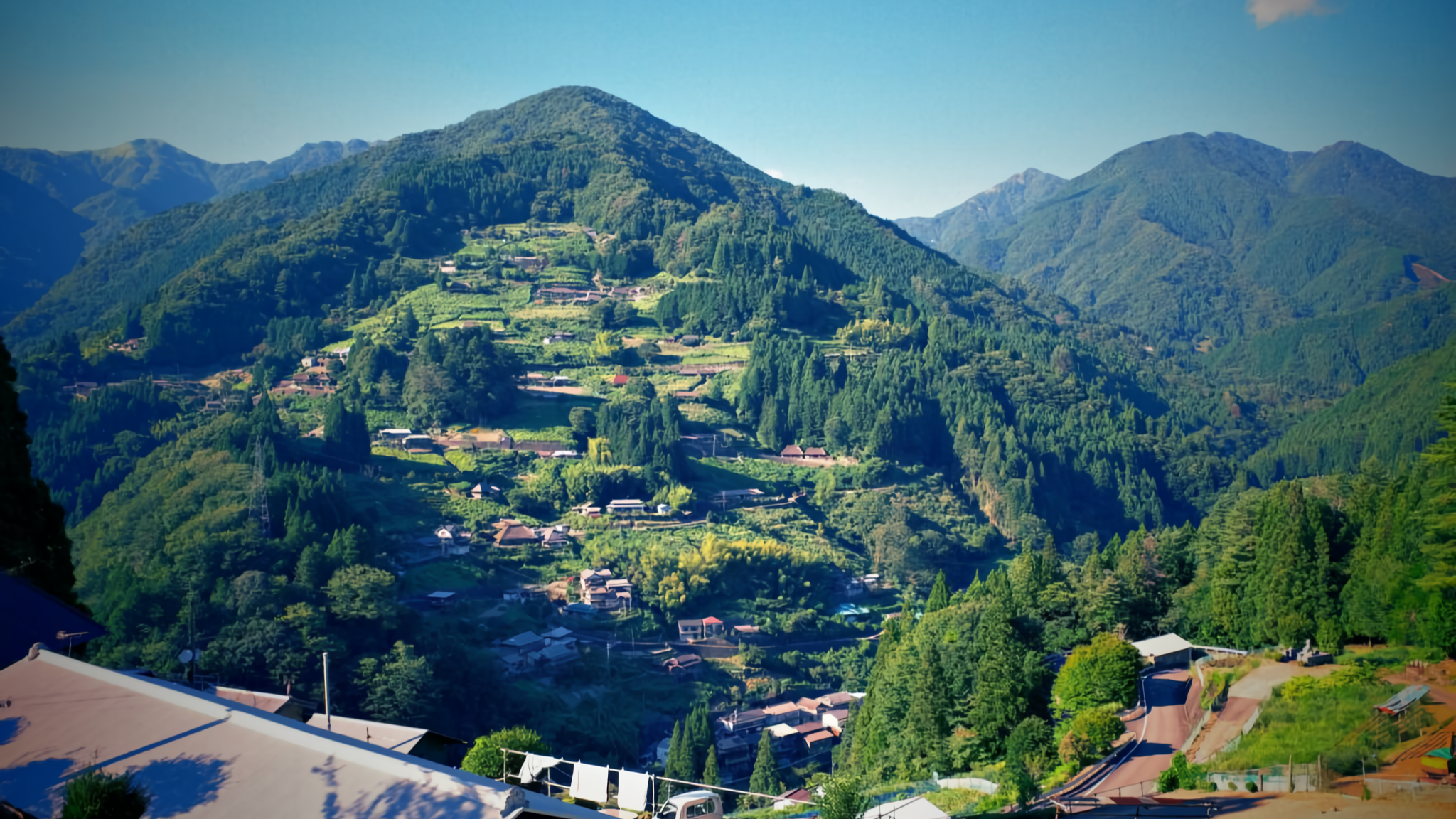 A scenic view of a mountainside village in the Iya Valley, 