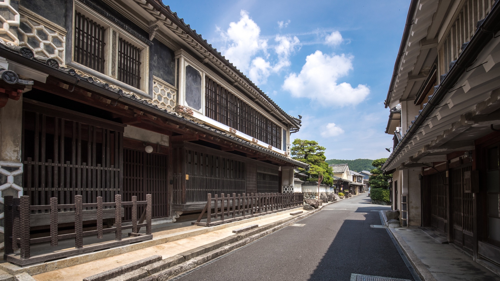 Restored Edo-period merchant houses line the quiet streets of Uchiko's Yokaichi-Gokoku Historic District, where wax and washi once brought the town prosperity.