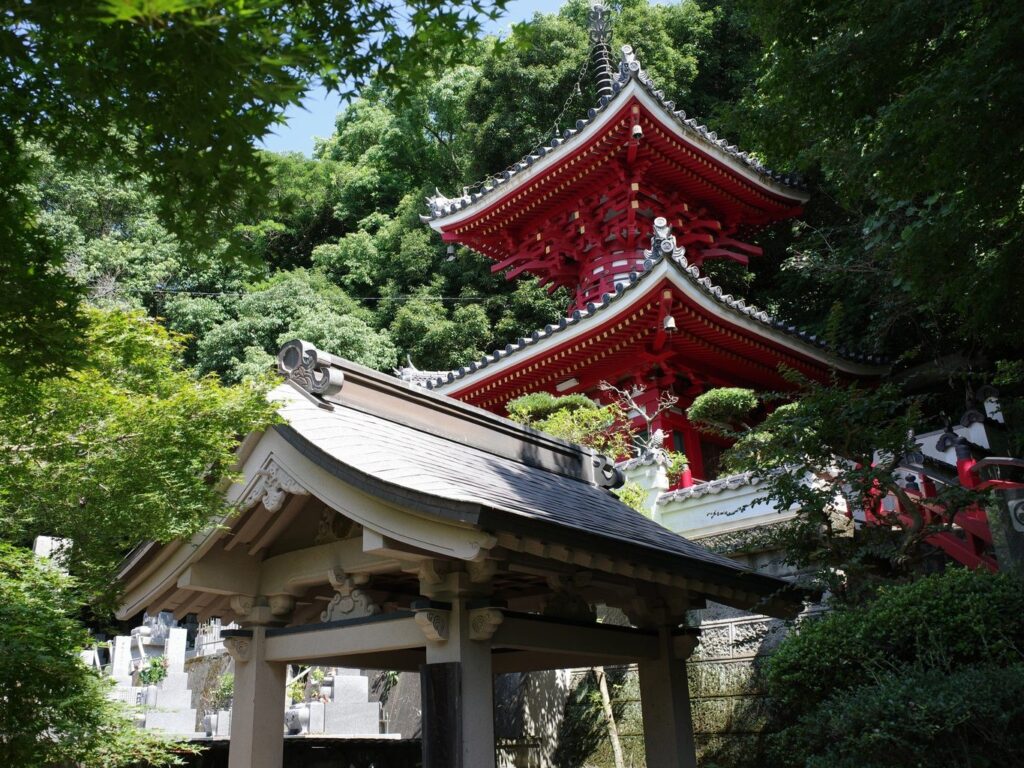 The two-storey pagoda of Konsen-ji, Pilgrimage Temple 2, surrounded in the rich greenery of the Tokushima countryside. 
